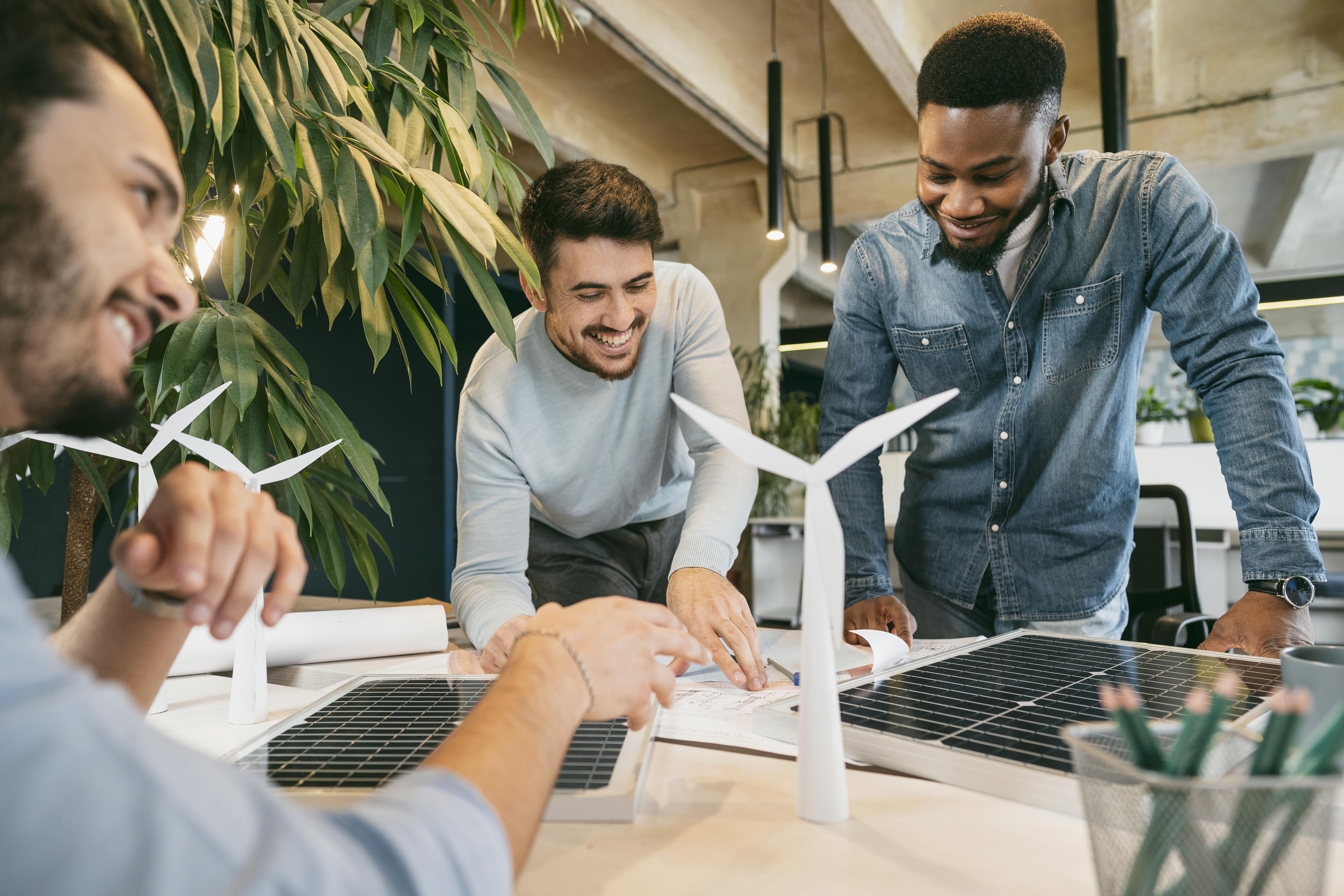 Team collaborating on wind energy project planning